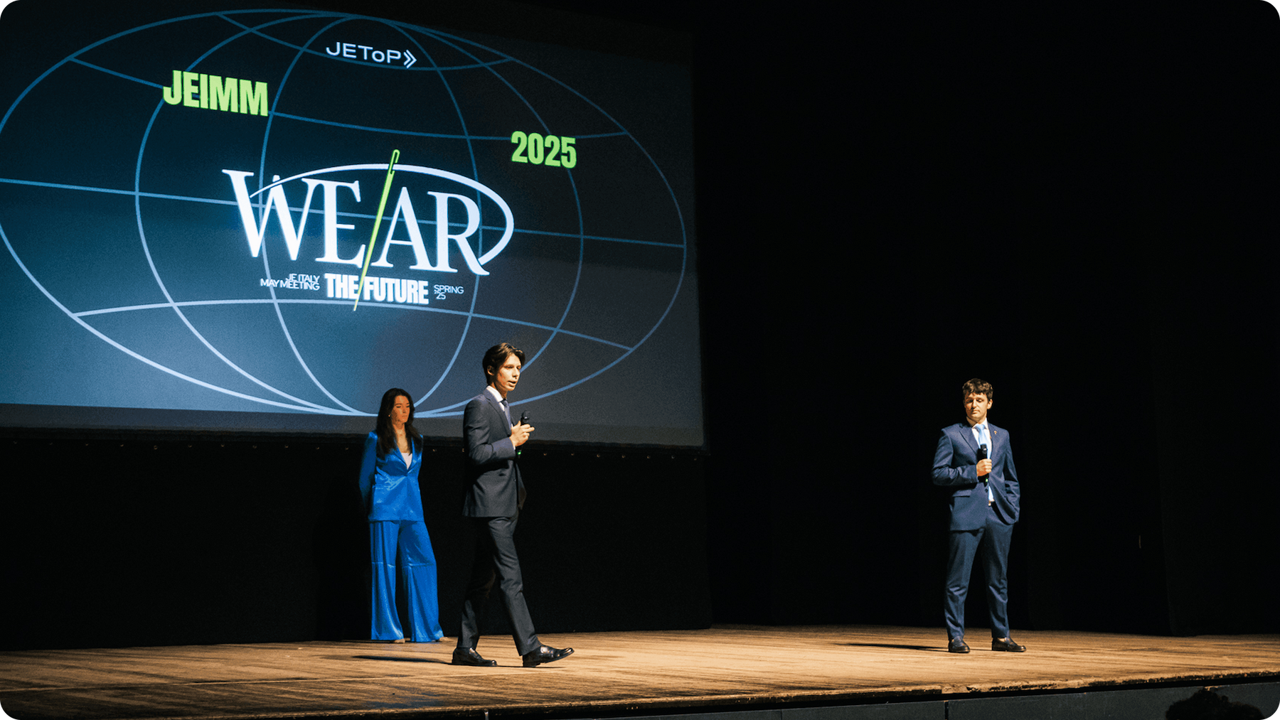 Speakers presenting on stage during the operational phase of the event