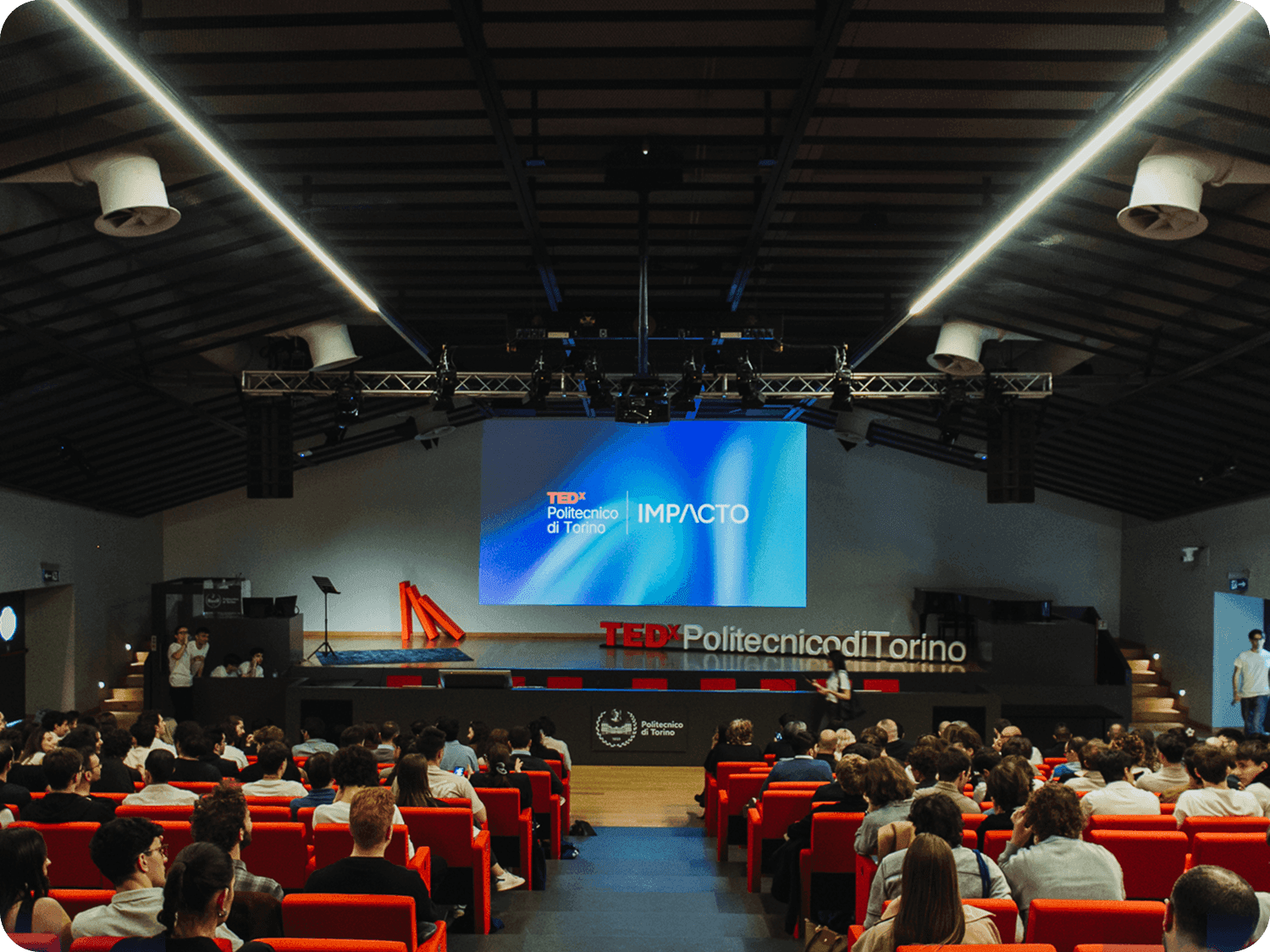 Audience and stage during the TEDx event organized at Politecnico di Torino