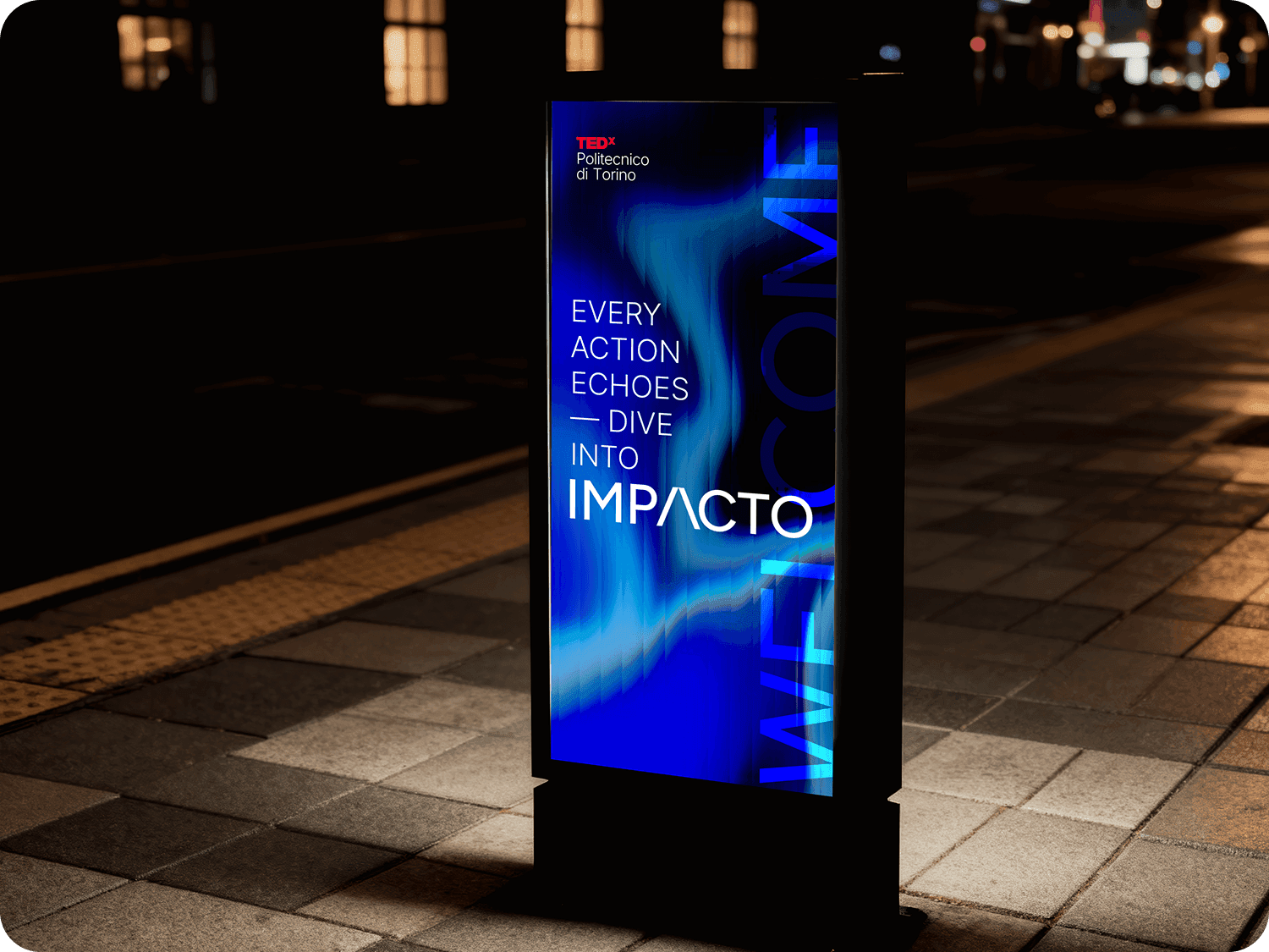 Promotional digital billboard with the IMPACTO event claim